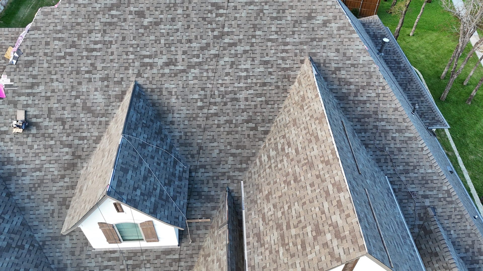 Multiple roof planes tied into the existing structure