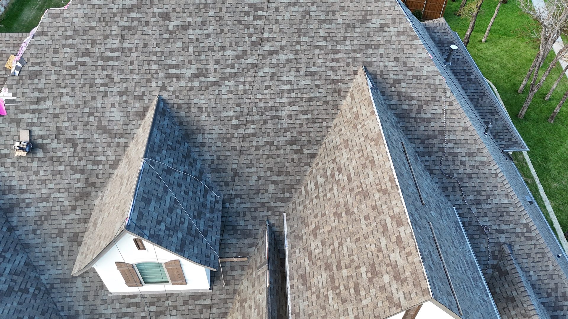 Multiple roof planes tied into the existing structure